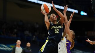 Tyasha Harris #52 of the Dallas Wings shoots the ball during the game against the Los Angeles Sparks on June1, 2021 at College Park Center in Arlington, Texas.