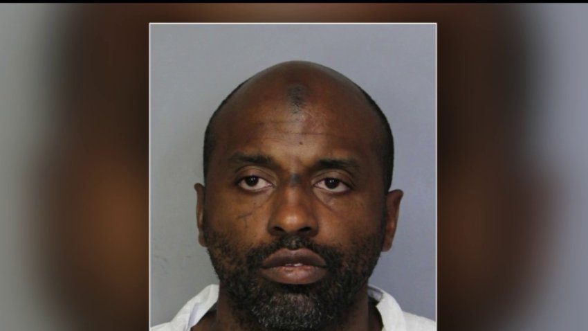 Keith Gibson is shown in a police booking photo.