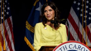 South Dakota Gov. Kristi Noem speaks to attendees at the North Carolina GOP convention on June 5, 2021 in Greenville, North Carolina. Former U.S. President Donald Trump is scheduled to speak at the NCGOP state convention in one of his first high-profile public appearances since leaving the White House in January.