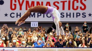 Simone Biles #227 competes on the beam during the Senior Women's competition of the 2021 U.S. Gymnastics Championships at Dickies Arena on June 4, 2021 in Fort Worth, Texas.