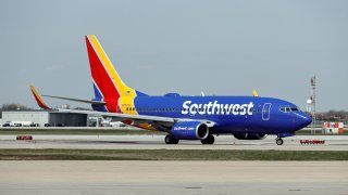 Southwest Airlines said Wednesday that it no longer expects to turn a profit in the third quarter as a surge in COVID-19 infections fueled by the highly contagious delta variant darkens the outlook for travel.