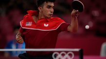 Nikhil Kumar, of United State competes during men's table tennis singles preliminary round match against Mongolia's Enkhbat Lkhagvasuren at the 2020 Summer Olympics, Saturday, July 24, 2021, in Tokyo.