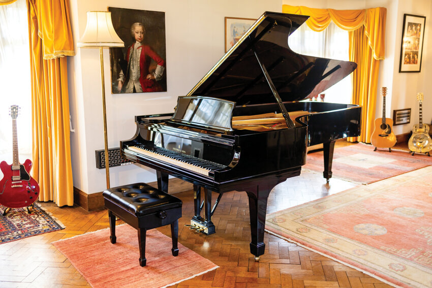 Bidding was already up to  $210,000 for Sir Elton John’s Steinway grand piano used exclusively in his concerts from 1974-1993.