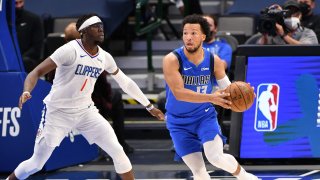 Jalen Brunson #13 of the Dallas Mavericks looks to pass against the LA Clippers during Round 1, Game 6 of the 2021 NBA Playoffs on June 4, 2021 at the American Airlines Center in Dallas, Texas.