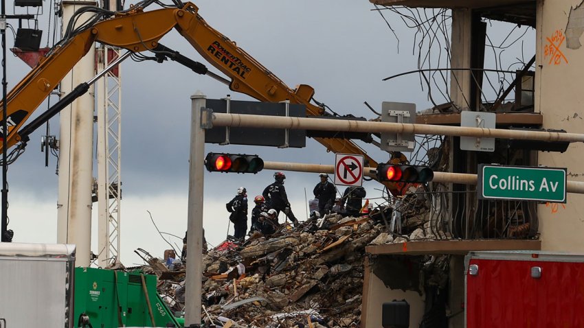 SURFSIDE, FLORIDA, USA – JUNE 30: Team of rescue workers are seen during a rescue operation of Champlain Tower partially collapsed in Surfside, Florida, United States on June 30, 2021. (Photo by Tayfun Coskun/Anadolu Agency via Getty Images)