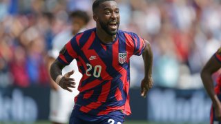 Shaq Moore #20 of the United States scores and celebrates his goal during a game between Canada and USMNT at Children's Mercy Park on July 18, 2021 in Kansas City, Kansas
