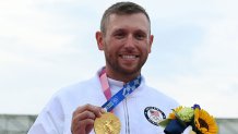 USA's Vincent Hancock poses on the podium with his gold medal after winning the mens skeet final during the Tokyo 2020 Olympic Games at the Asaka Shooting Range in the Nerima district of Tokyo on July 26, 2021.