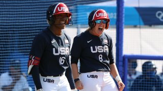 Michelle Moultrie and Haylie McCleney of Team USA react to Ali Aguilar's two-run single