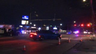 One person was hit and killed Friday night by a driver suspected of running a red light after fleeing from officers, Arlington police say.