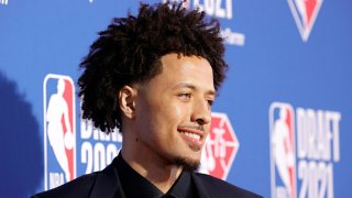 Cade Cunningham poses for photos on the red carpet during the 2021 NBA Draft at the Barclays Center on July 29, 2021 in New York City.