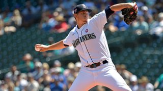 Chris Flexen #77 of the Seattle Mariners throws a pitch during the first inning of the game against the Texas Rangers at T-Mobile Park on July 4, 2021 in Seattle, Washington.