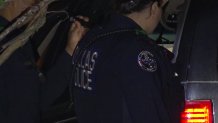 Dallas police investigate a fatal shooting on Aspen Street, July 20, 2021.