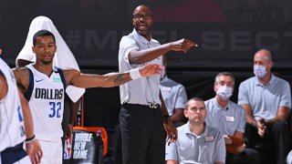 FILE: Jamahl Mosley of the Dallas Mavericks coaches against the Milwaukee Bucks on August 8, 2020 in Orlando, Florida at AdventHealth Arena.