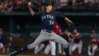 Starting pitcher Logan Gilbert #36 of the Seattle Mariners pitches during the first inning of a baseball game against the Texas Rangers at Globe Life Field on July 30, 2021 in Arlington, Texas.