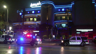 Two men died and a woman was wounded in what Houston police said was a murder-suicide at a downtown seafood restaurant.