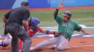 Mexican runner tagged out at home