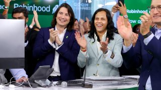 Vlad Tenev and Baiju Bhatt react to the first trade on Robinhood Markets IPO Listing Day on July 29, 2021 in New York City.