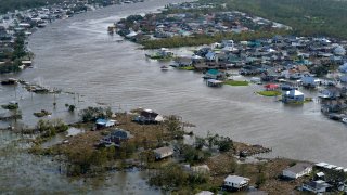 A flooded city is seen in the aftermath of Hurricane Ida, Monday, Aug. 30, 2021, in Lafitte, La.
