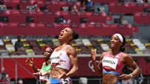 Puerto Rico's Jasmine Camacho-Quinn wins the Women's 100-Meter Hurdles final ahead of the United State's Kendra Harrison during the Tokyo 2020 Olympic Games at the Olympic Stadium in Tokyo, Japan on Aug. 2, 2021.