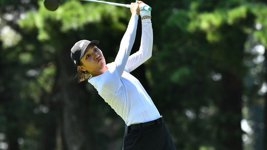 New Zealand's Lydia Ko watches her drive from the 9th tee in women's golf individual stroke play during the Tokyo 2020 Olympic Games at the Kasumigaseki Country Club in Kawagoe on Aug. 6, 2021.