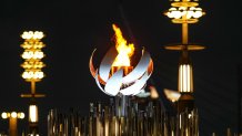 The Olympic flame burns on the cauldron at Ariake Yume-no-Ohashi Bridge, July 29, 2021, in Tokyo, Japan.