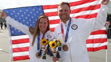 Bronze Medalists Madelynn Ann Bernau and Brian Burrows of Team United States pose following the Trap Mixed Team Bronze Medal Match on day eight of the Tokyo 2020 Olympic Games at Asaka Shooting Range on July 31, 2021, in Asaka, Saitama, Japan.