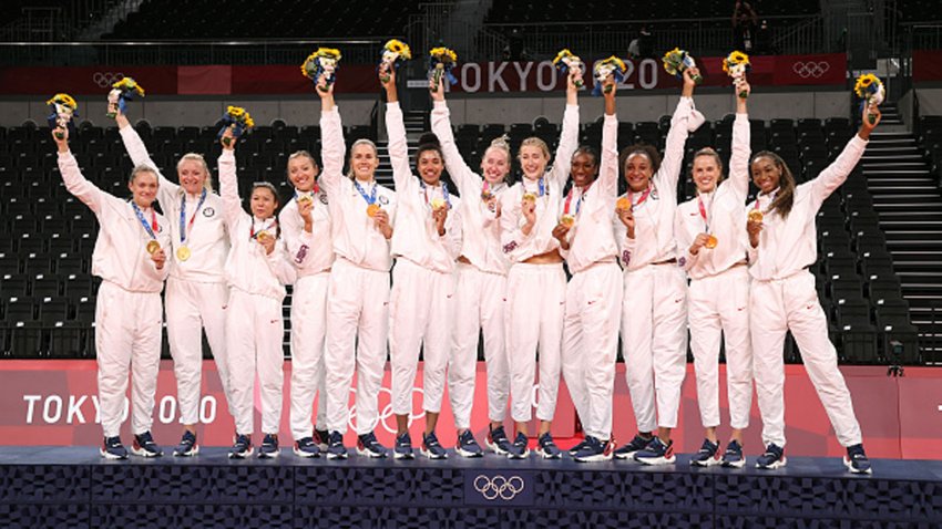 layers of Team United States react as they receive their Gold Medals during the Victory Ceremony following the Women’s Gold Medal Volleyball match between Brazil and United States on day sixteen of the Tokyo 2020 Olympic Games.