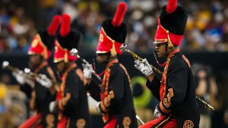 The drum majors of Grambling State "World Famed" Band march into position during the 45th annual State Farm Bayou Classic game between the Southern Jaguars and the Grambling State Tigers on Saturday November 24, 2018 at the Mercedes-Benz Super Dome in New Orleans, Louisiana.