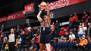 Natasha Cloud #9 of the Washington Mystics shoots a three point basket during the game against the Dallas Wings on Aug. 28, 2021 at Entertainment & Sports Arena in Washington, DC.