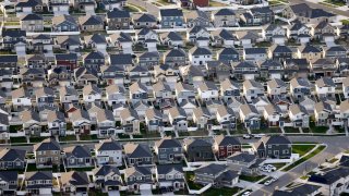 Rows of homes, are shown in suburban Salt Lake City, on April 13, 2019.