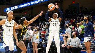 Arike Ogunbowale #24 of the Dallas Wings shoots a three point basket during the game against the Los Angeles Sparks on Sept. 19, 2021 at College Park Center in Arlington, Texas.