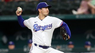 Kohei Arihara #35 of the Texas Rangers pitches in the first inning against the Houston Astros at Globe Life Field on Sept. 15, 2021 in Arlington, Texas.