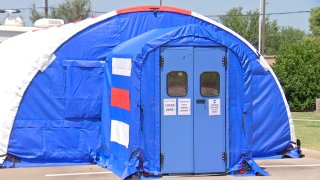 A blue tent set up outside the Rockwall County Courthouse could be the tool they need to curb COVID-19 hospitalizations.