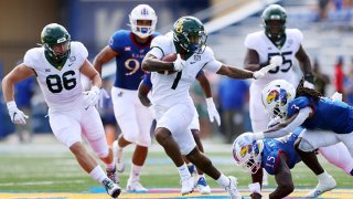 Running back Trestan Ebner #1 of the Baylor Bears carries the ball during the game against the Kansas Jayhawks at David Booth Kansas Memorial Stadium on Sept. 18, 2021 in Lawrence, Kansas.