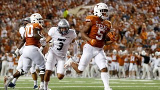 Bijan Robinson #5 of the Texas Longhorns rushes for a touchdown in the second quarter against the Rice Owls at Darrell K Royal-Texas Memorial Stadium on Sept. 18, 2021 in Austin, Texas.