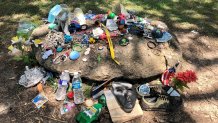 People leave all kinds of odd trinkets on Ned's grave site.