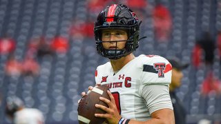 FILE: Texas Tech Red Raiders quarterback Tyler Shough (12) warms up before the football game between the Texas Tech Red Raiders and University of Houston Cougars at NRG Stadium on Sept. 4, 2021 in Houston, Texas.