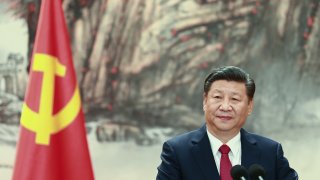 Chinese President Xi Jinping speaks during the unveiling of the Communist Party’s new Politburo Standing Committee on October 25, 2017 in Beijing, China.