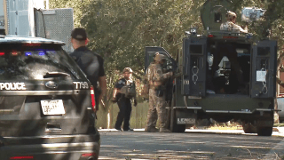 Man at center of SWAT incident in SW Austin dead after shooting with officer, house fire.