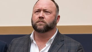 FILE - This Tuesday, Dec. 11, 2018 file photo shows radio show host and conspiracy theorist Alex Jones at Capitol Hill in Washington. On Thursday, April 9, 2020, the U.S. Food and Drug Administration sent a warning letter ordering Jones to stop falsely claiming that toothpaste, mouth wash and other products sponsored by his show can help prevent COVID-19.