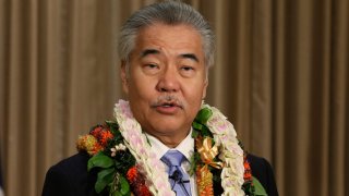 FILE - In this Jan. 21, 2020, file photo, Gov. David Ige speaks to reporters in Honolulu after delivering his state of the state address at the Hawaii State Capitol. Many state and local governments across the country have suspended public records requirements amid the coronavirus pandemic, denying or delaying access to information that could shed light on key government decisions. Ige issued one of the most sweeping orders, suspending the state's entire open-records law in mid-March.