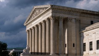 FILE - This June 8, 2021 file photo shows the Supreme Court building in Washington. The future of abortion rights is in the hands of a conservative Supreme Court that is beginning a new term Monday, Oct. 4, that also includes major cases on gun rights and religion.