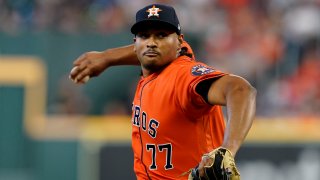 Houston Astros starting pitcher Luis Garcia throws against the Boston Red Sox during the first inning in Game 2 of baseball's American League Championship Series Saturday, Oct. 16, 2021, in Houston.