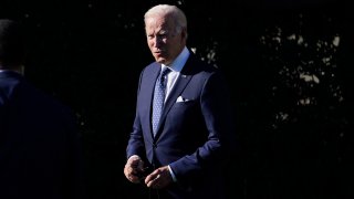 President Joe Biden walks back to the Oval Office after speaking to the 2020 and 2021 State and National Teacher of the Year recipients during an event on the South Lawn of the White House in Washington, Monday, Oct. 18, 2021.