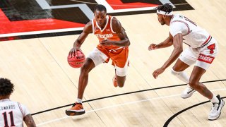 Guard Andrew Jones #1 of the Texas Longhorns handles the ball during the first half of the college basketball game against the Texas Tech Red Raiders at United Supermarkets Arena on Feb. 27, 2021 in Lubbock, Texas.