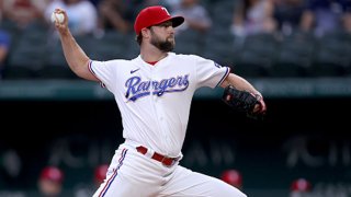 Jordan Lyles #24 of the Texas Rangers pitches against the Cleveland Indians in the top of the first inning at Globe Life Field on Oct. 02, 2021 in Arlington, Texas.