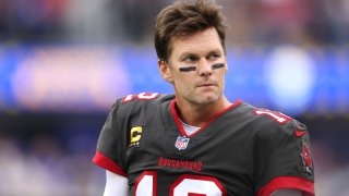 Tom Brady #12 of the Tampa Bay Buccaneers on the sideline during the first quarter in the game against the Los Angeles Rams at SoFi Stadium on September 26, 2021 in Inglewood, California.