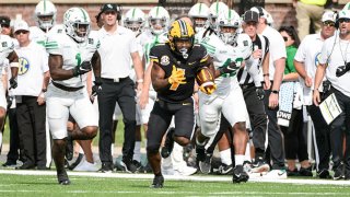 Missouri Tigers running back Tyler Badie (1) breaks free for a big run during a game between the North Texas Mean Green and the Missouri Tigers on Oct. 9, 2021, at Faurot Field at Memorial Stadium in Columbia, Missouri.