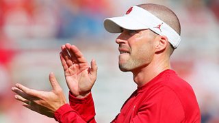 Defensive coordinator Alex Grinch of the Oklahoma Sooners encourages his team before a game against the Tulane Green Wave at Gaylord Family Oklahoma Memorial Stadium on Sept. 4, 2021 in Norman, Oklahoma. Oklahoma won 40-35.