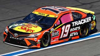 Martin Truex Jr., driver of the #19 Bass Pro Shops Toyota, drives during the NASCAR Cup Series Bank of America ROVAL 400 at Charlotte Motor Speedway on Oct. 10, 2021 in Concord, North Carolina.
